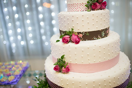closeup photo of 4-tier fondant cake thumbnail