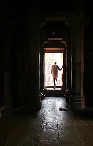 man standing in front of the door thumbnail