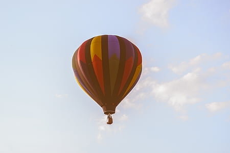 multicolored hot air balloon floating on air thumbnail