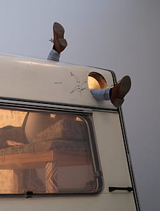 person lying on bed inside RV thumbnail