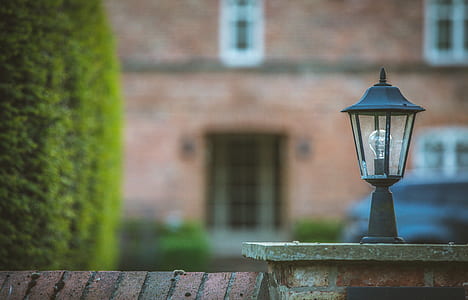 shallow depth of field photo of turned-off lamp post thumbnail