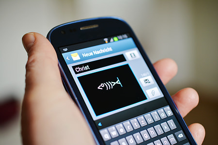 person holding black android smartphone thumbnail