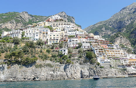 white houses at top of hill thumbnail