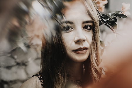 macro photography of woman facing the camera thumbnail