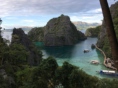 island surrounded by body of water thumbnail