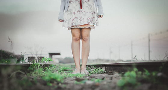 photo of woman wearing white and red dress thumbnail