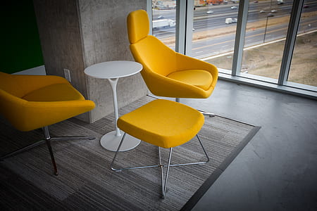 round white table with three padded chairs set thumbnail