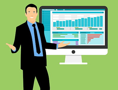 Man wth screens full of financial information. thumbnail