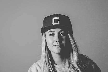 woman wearing flat-brimmed cap thumbnail