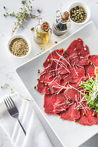 Meat With Vegetable and Seasonings on Plate thumbnail