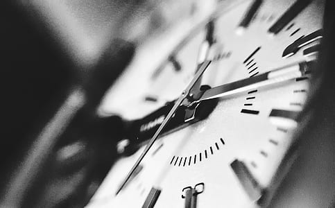 closeup grayscale photography of watch thumbnail