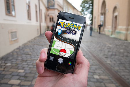 selective focus photography of Pokemon Go game application on spacegray iPhone 5s thumbnail