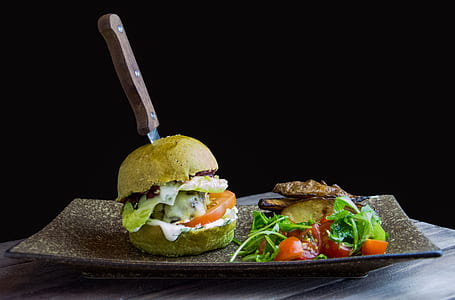 baked burger on brown ceramic plate thumbnail