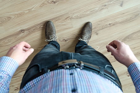 Person Wearing Black Jeans While Standing thumbnail