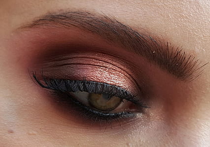 close up photo of women's eyes thumbnail