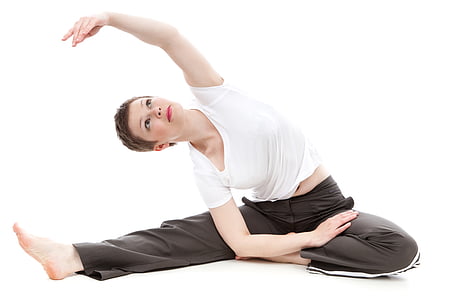 woman in white crew-neck t-shirt doing yoga thumbnail