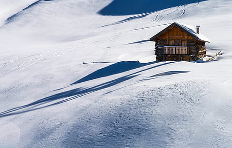 Brown Wooden House on Snow thumbnail