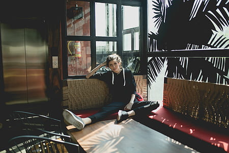 woman sitting on section sofa thumbnail