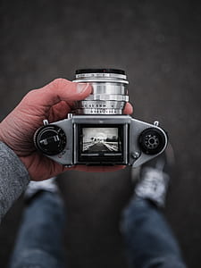 gray and black DSLR camera turned on thumbnail
