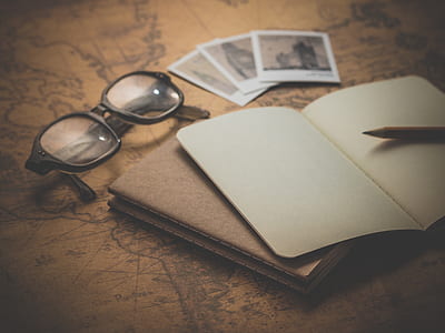 eyeglasses near book thumbnail