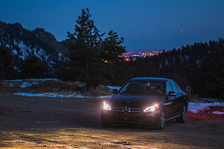 black Mercedes-Benz sedan near tree thumbnail
