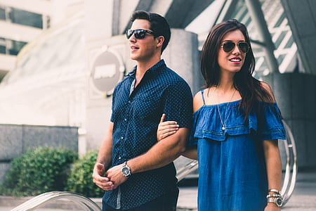 woman holding man left hand walking thumbnail