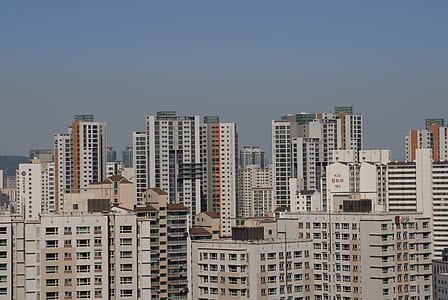 white concrete building at daytime thumbnail
