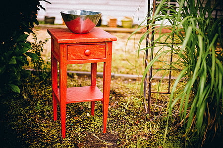 selective focus photography of silver bowl on side table thumbnail