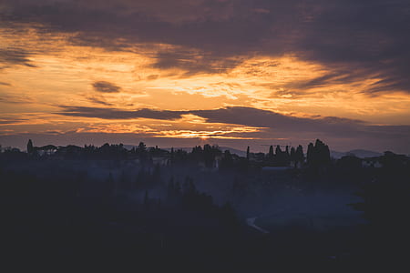 silhouette of city during golden hour thumbnail