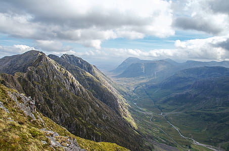 rocky mountain under white sky thumbnail