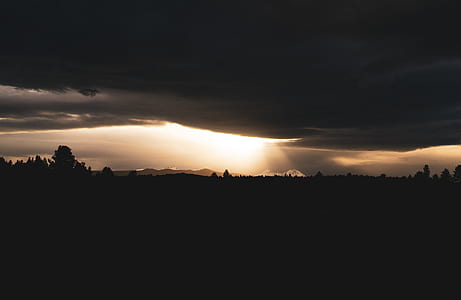 silhouette of mountains during sunset thumbnail