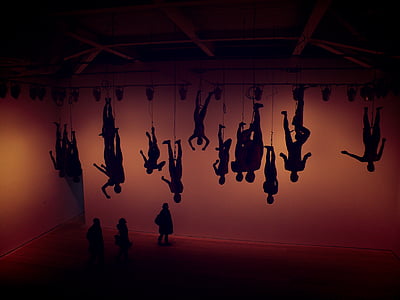 silhouette of hanging men thumbnail