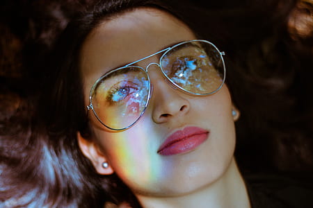 brunette haired woman wearing eyeglasses thumbnail