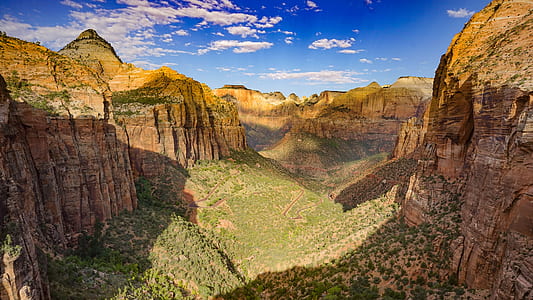 bird's-eye view photography of mountains during white cloudy skies thumbnail