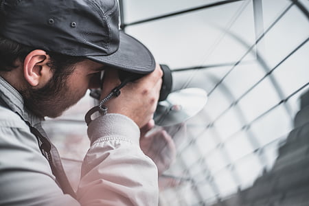 man using DSLR camera thumbnail