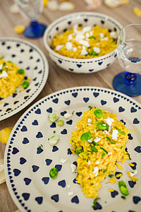 Risotto with broad bean on a cute plate with blue hearts thumbnail