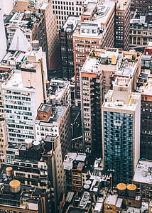 aerial photography of city building during daytime thumbnail