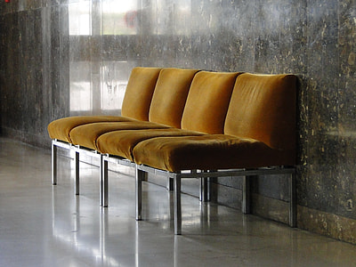 empty brown padded chairs thumbnail