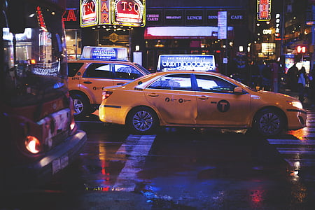 yellow sedan on road thumbnail