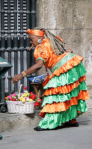 woman about to hold white basket with flowers thumbnail