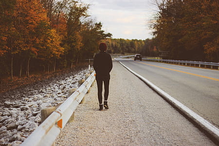 person walking on road thumbnail