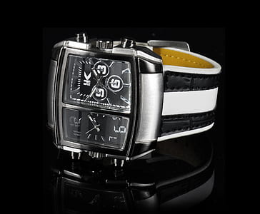 square silver and black analog watch with white strap thumbnail