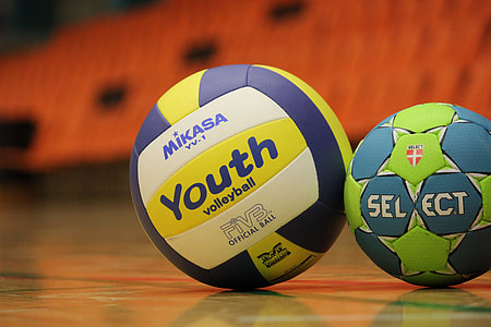 white, blue, and yellow Mikasa ball thumbnail