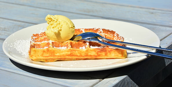 waffle with ice cream on top in white ceramic plate thumbnail