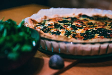 Close-up plated spinach quiche on the table thumbnail