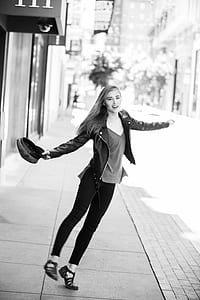 Woman Wearing Black Leather Jacket Grayscale Photo thumbnail