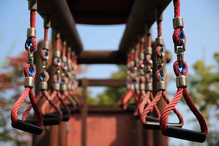 selective focus photograph of hanging grip handles thumbnail