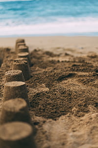sand cups on beach thumbnail