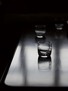 clear shot glass on table thumbnail