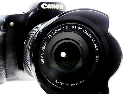black Canon DSLR camera thumbnail